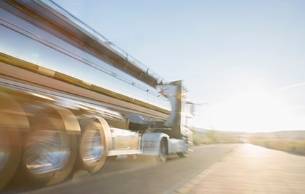 semi driving on a highway