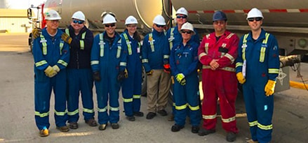 Engineers in front of truck
